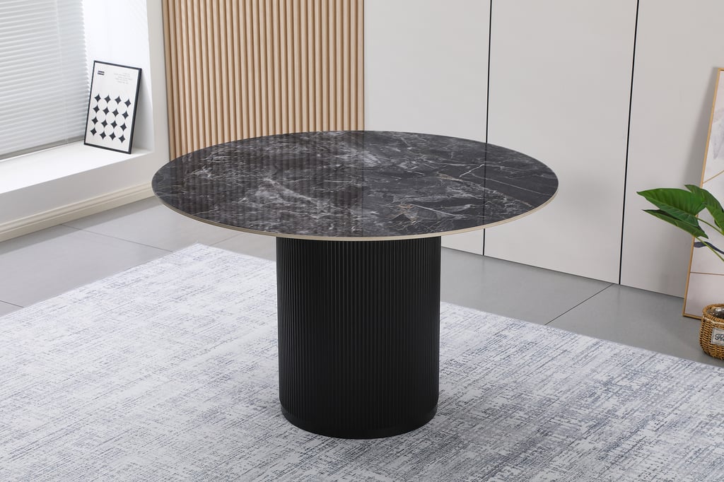 North Collection Kalida ruokapöytä pyöreä 120cm musta: Tyylikäs musta pyöreä ruokapöytä, täydellinen kahdelle tai neljälle. Sopii moderniin ruokailutilaan tai loft-tyyliin. Kestävä ja elegantti valinta.