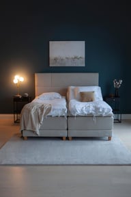 Dream Best moottorijenkkisänky 180x210 beige, petauspatjalla ja päädyllä: Dynaaminen moottorisänky, leveys 180 cm, säädettävä mukavuus ja tuki. Täydellinen valinta makuuhuoneeseen moderniin sisustukseen.